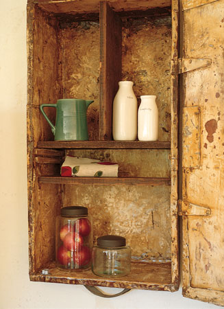 These spice cabinets are made from old wooden trunks installed in the wall. One is deeper than the other, so it’s sunk into the wall, while the other is surface mounted. It gives that “fun, childish element of surprise, to open a cabinet and find a little cubbyhole,” says John.